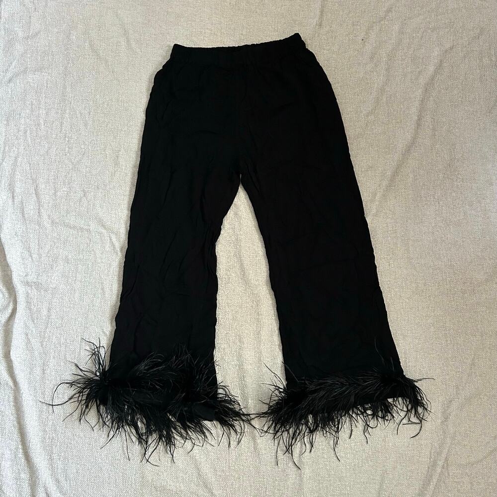 black sleeper pants with ostritch feather trim